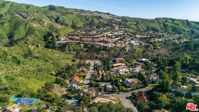 a view of a city and mountains