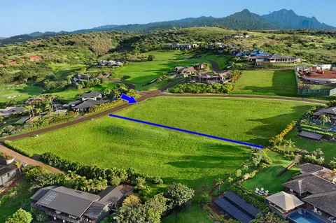 a view of a yard with an ocean view