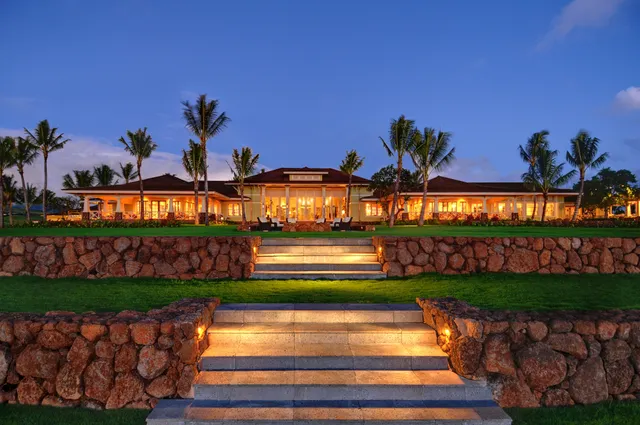 a dining room with furniture window and outside view