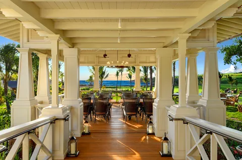 a view of a swimming pool with an ocean view