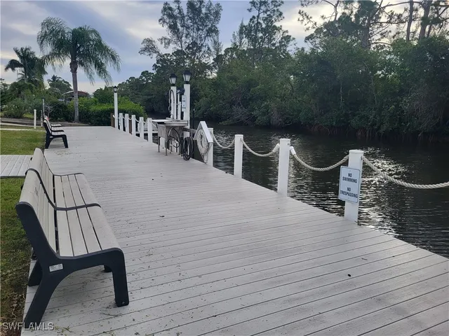 a view of a chairs and tables in a patio