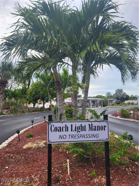87 Middlesex Road Fort Myers, FL 33908 - Photo 7 of 7 a street sign next to a road