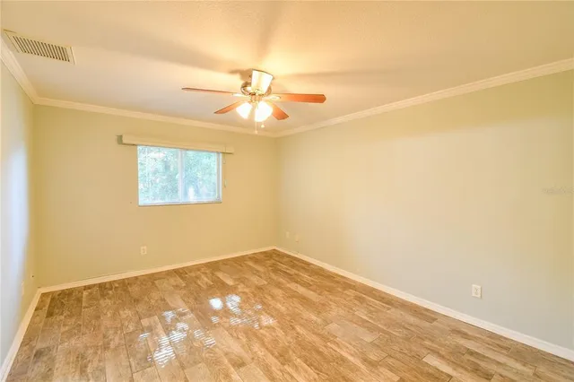 a bathroom with a toilet a sink and a mirror
