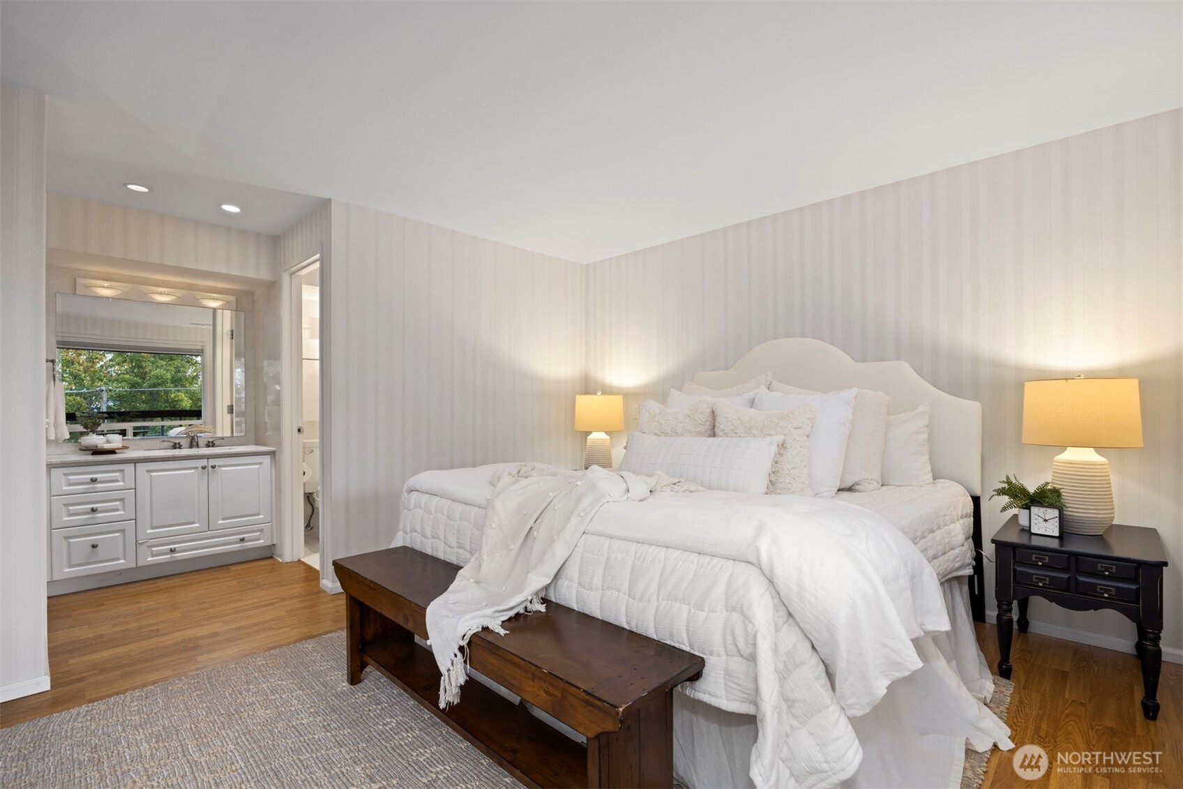 337 South State Street, Unit 2 Bellingham, WA 98225 - Photo 21 of 40 a bedroom with a bed and large windows