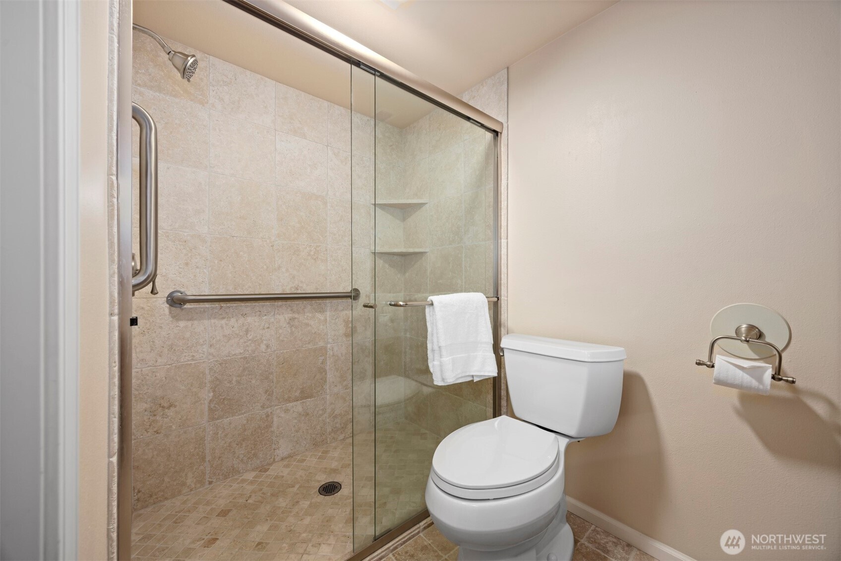 337 South State Street, Unit 2 Bellingham, WA 98225 - Photo 28 of 40 a white toilet sitting next to a bathroom sink