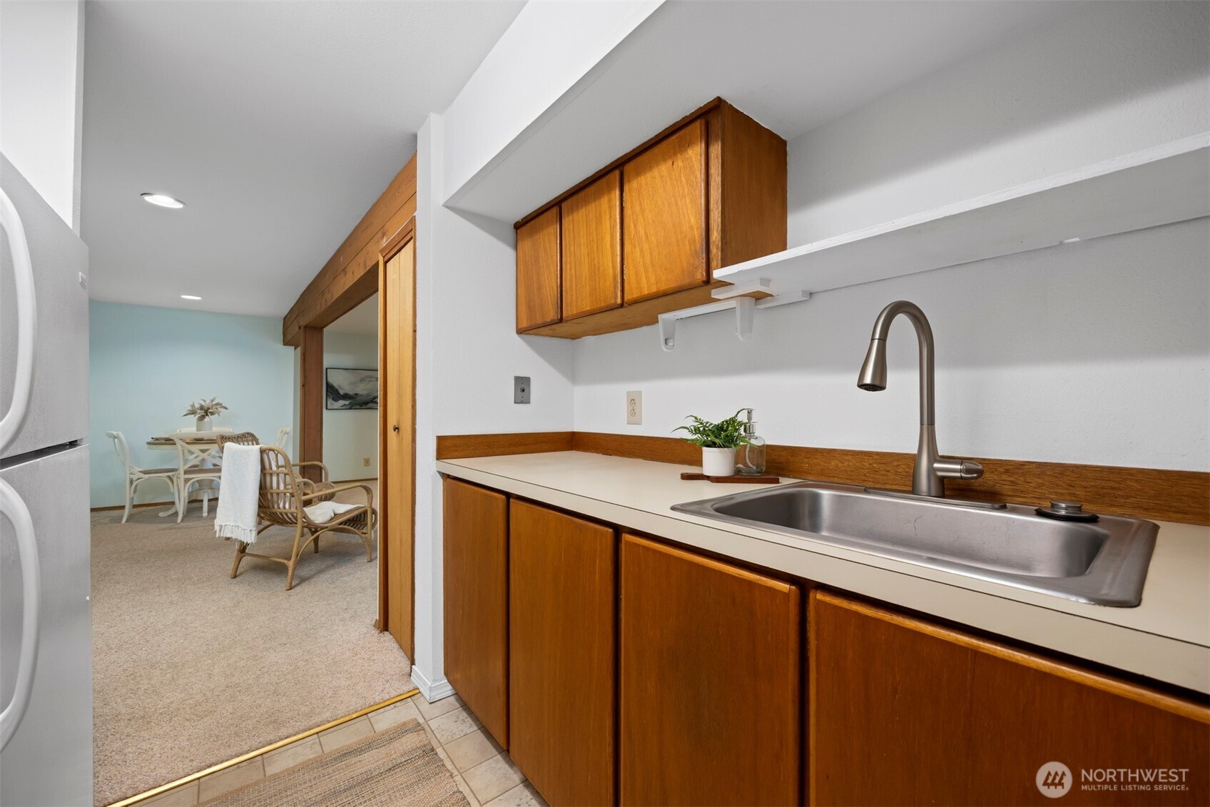 337 South State Street, Unit 2 Bellingham, WA 98225 - Photo 35 of 40 a kitchen with a sink and a refrigerator