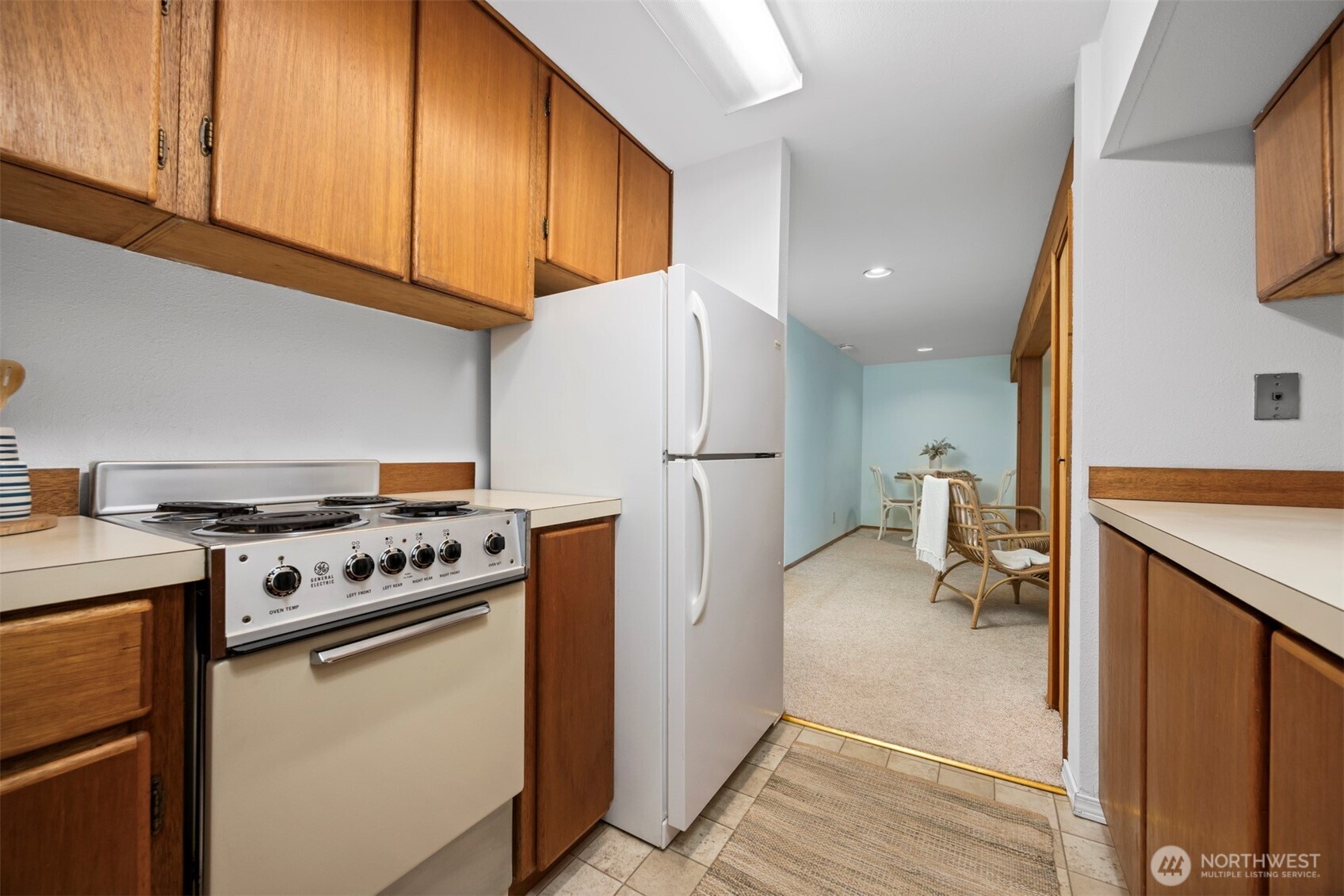 337 South State Street, Unit 2 Bellingham, WA 98225 - Photo 36 of 40 a kitchen with a stove and a refrigerator