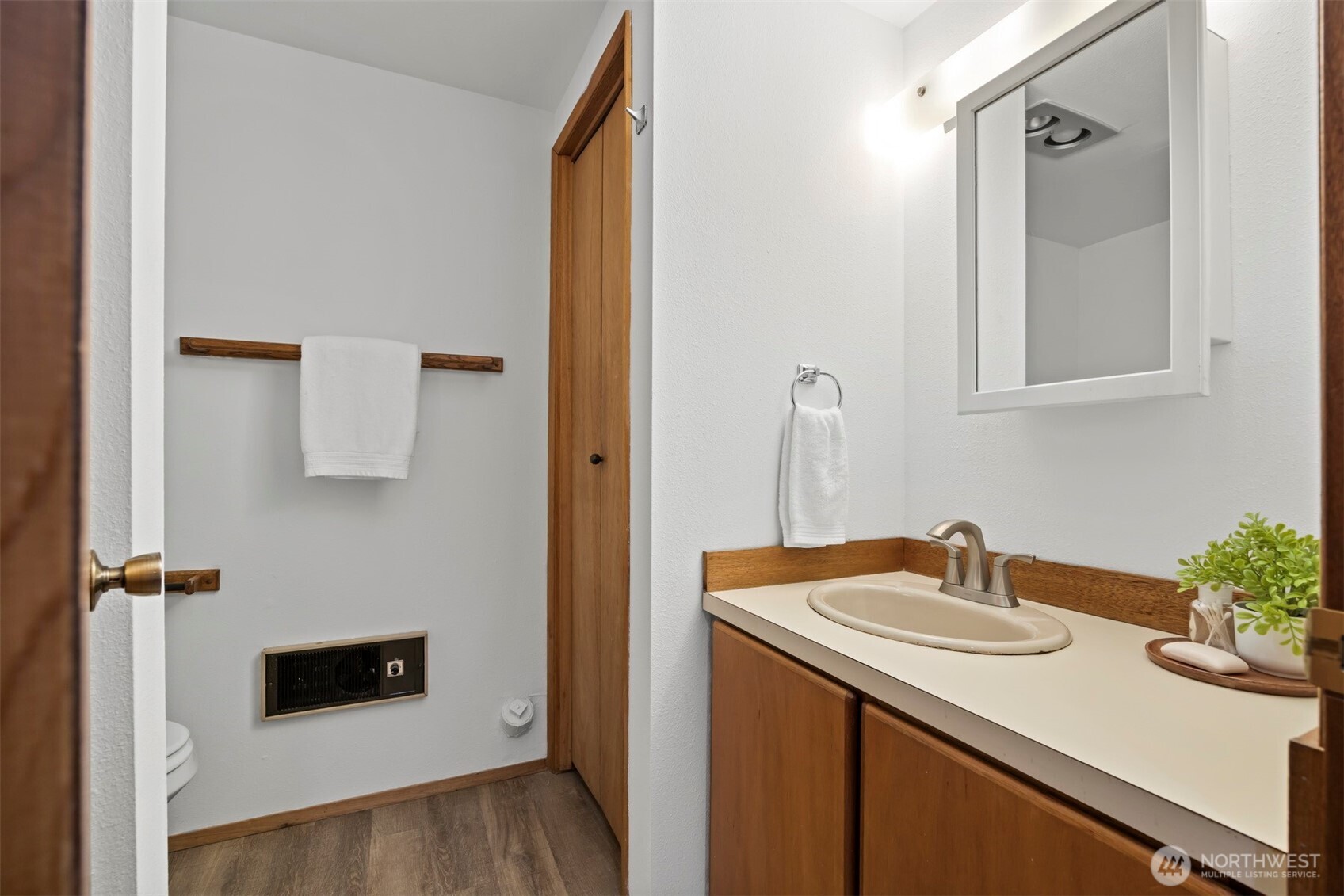 337 South State Street, Unit 2 Bellingham, WA 98225 - Photo 37 of 40 a bathroom with a sink and a mirror
