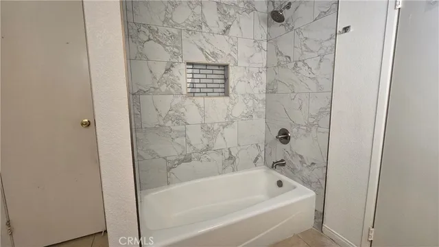 a bathroom with a bathtub