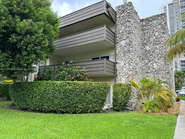 a view of a backyard with plants