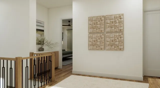 an entryway with a white walls