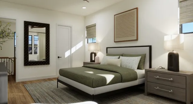 a bedroom with a bed and a night stand