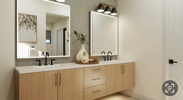 a bathroom with a double vanity sink and a mirror