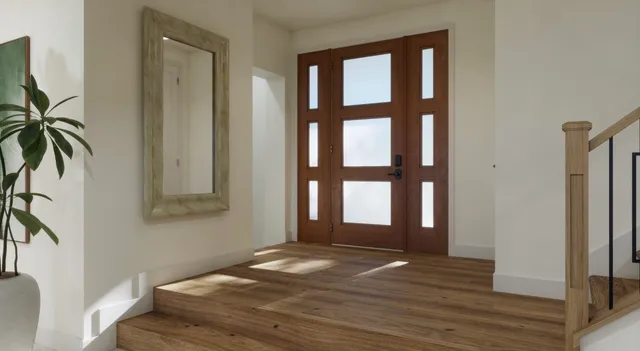 a view of empty room with window and wooden floor