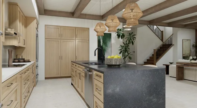 a kitchen with stainless steel appliances granite countertop a stove a sink and a refrigerator