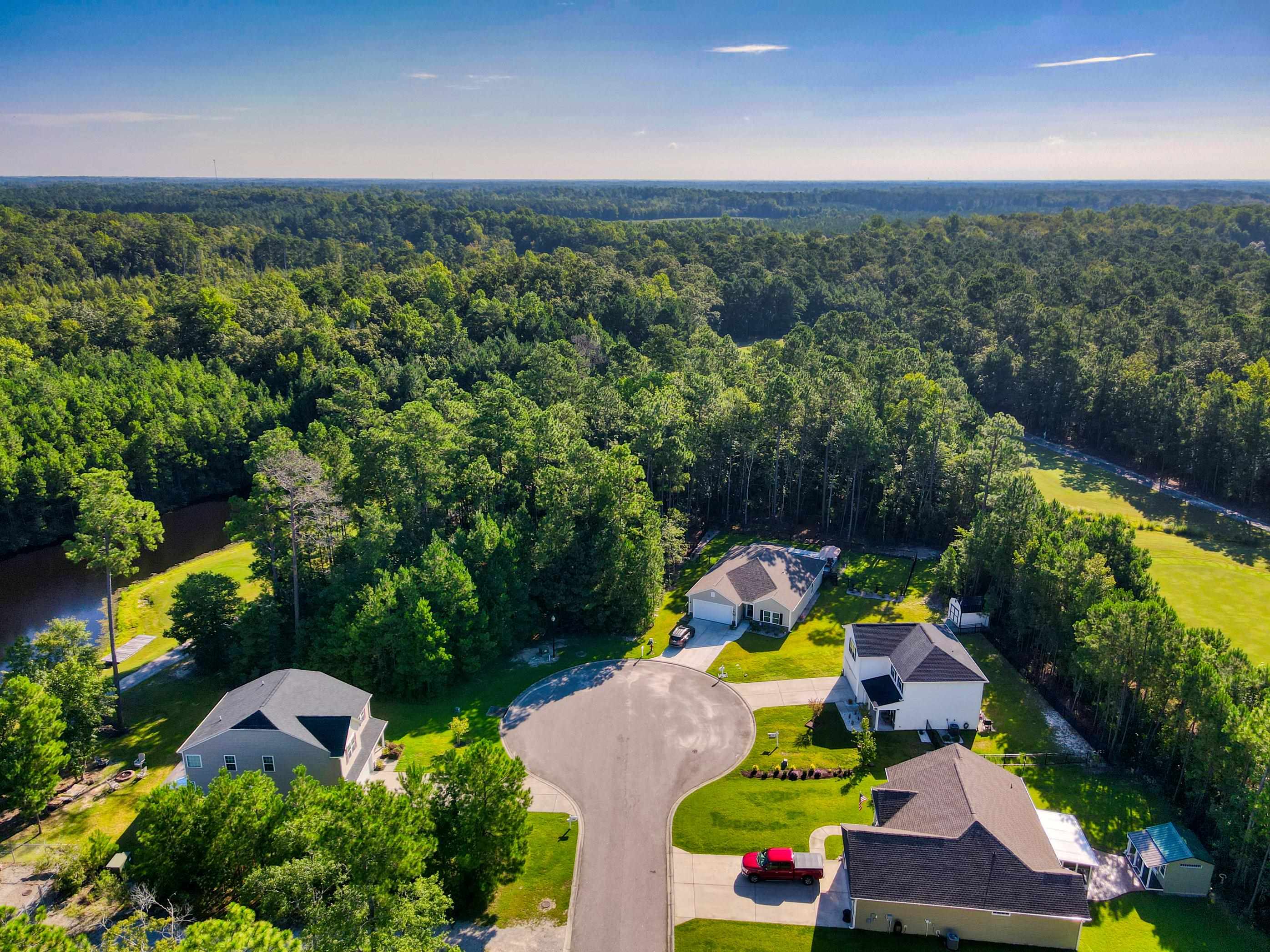 677 Timber Creek Drive Loris, SC 29569 - Photo 27 of 33 Aerial view of property's location featuring a local golf course and a nearby body of water
