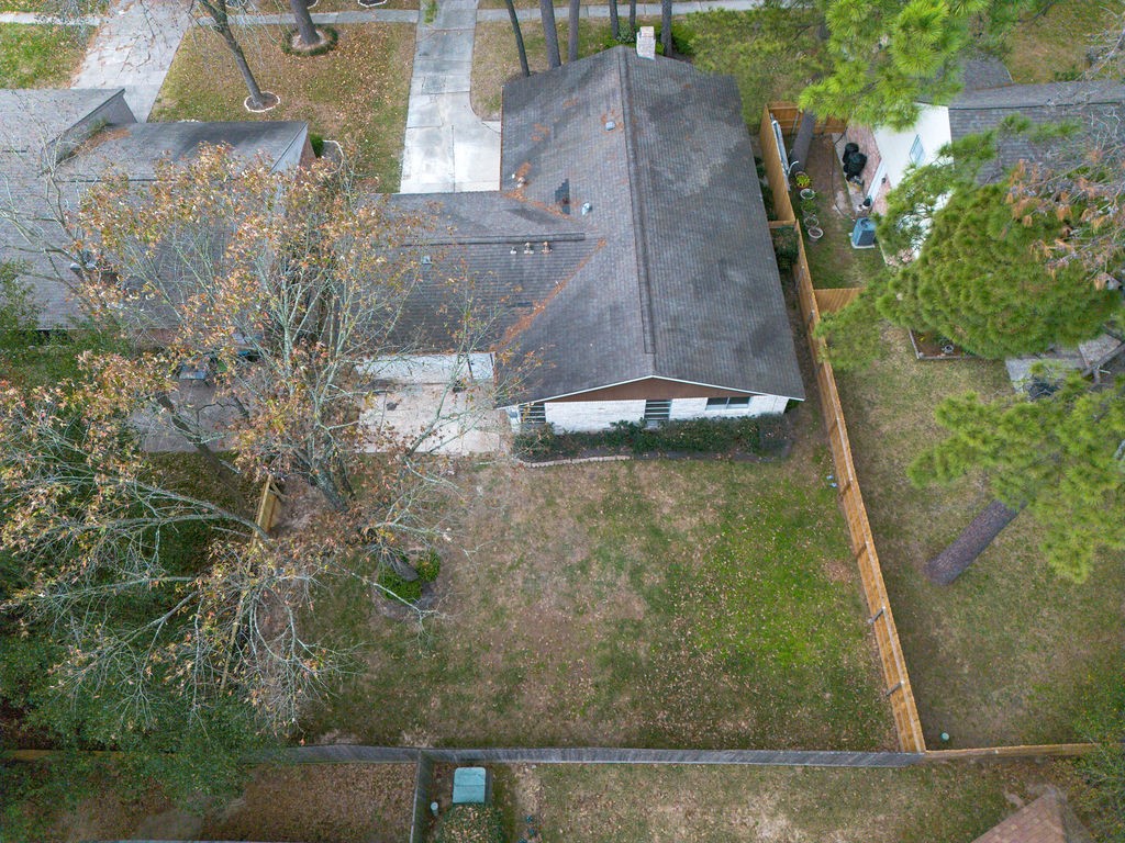23230 Briarcreek Boulevard Spring, TX 77373 - Photo 29 of 32 an aerial view of a house with a yard