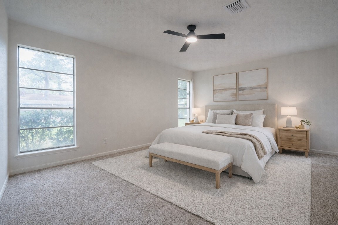 23230 Briarcreek Boulevard Spring, TX 77373 - Photo 5 of 32 a bedroom with a bed and a window