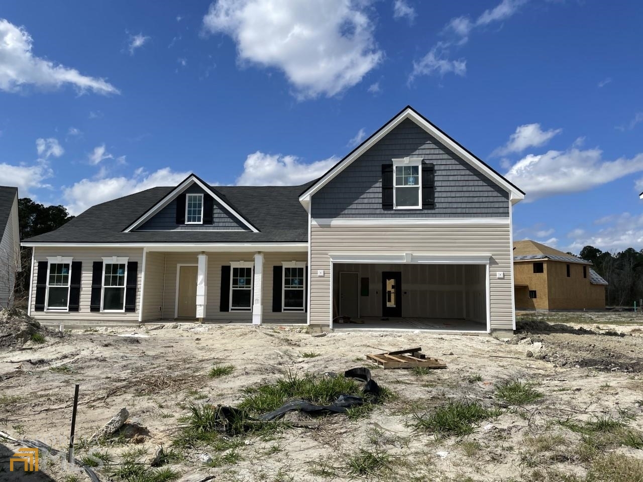 102 Olson Way Kingsland, GA 31548 - Photo 1 of 1 a front view of a house with a yard and garage