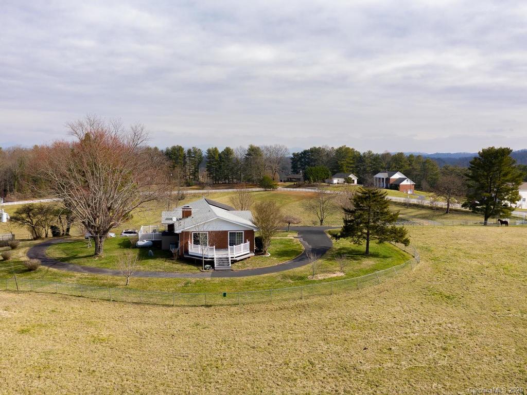 321 Gouges Branch Road Leicester, NC 28748 - Photo 26 of 48 a view of a lake with houses