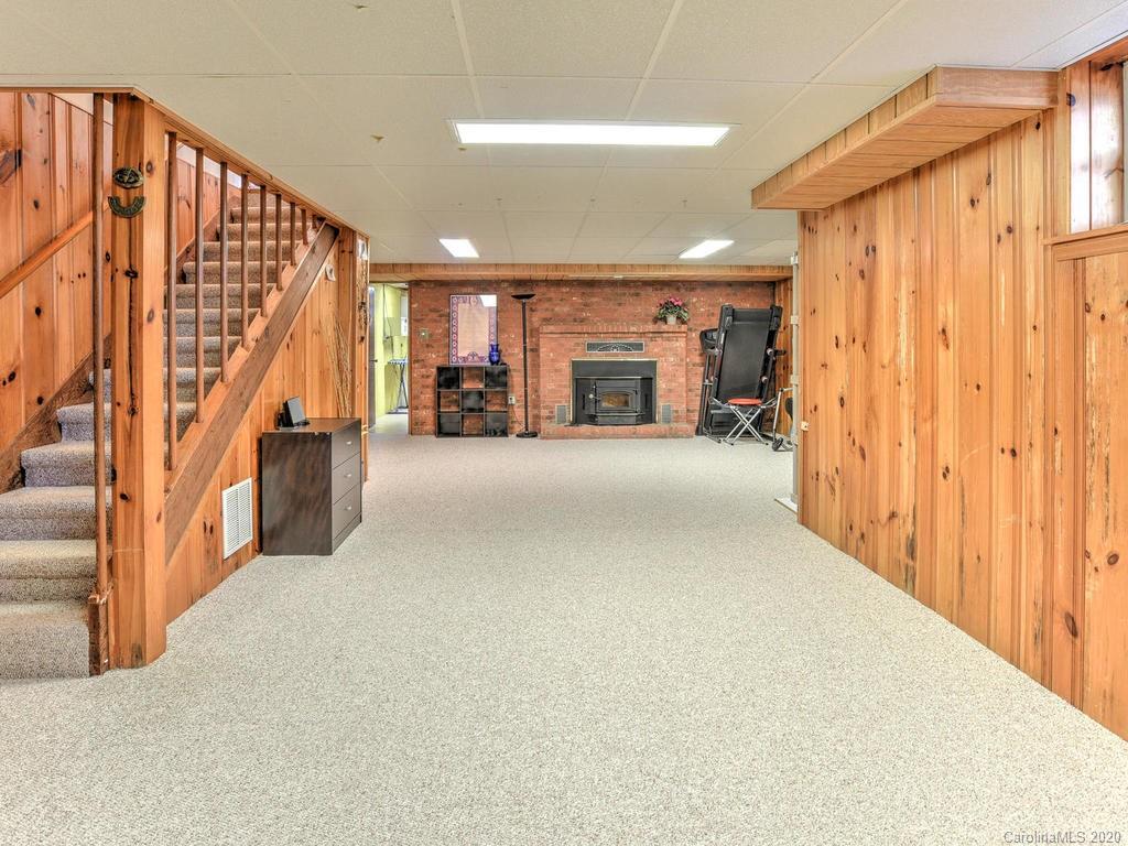 321 Gouges Branch Road Leicester, NC 28748 - Photo 30 of 48 a view of a hall with stairs
