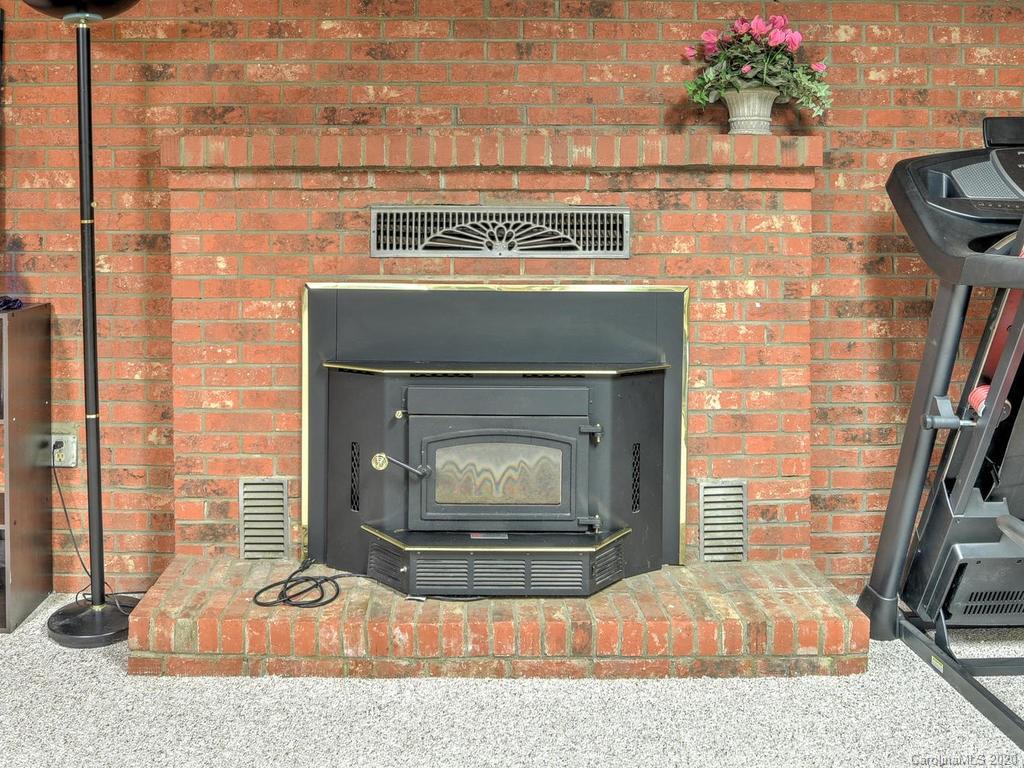 321 Gouges Branch Road Leicester, NC 28748 - Photo 33 of 48 a living room with a fireplace