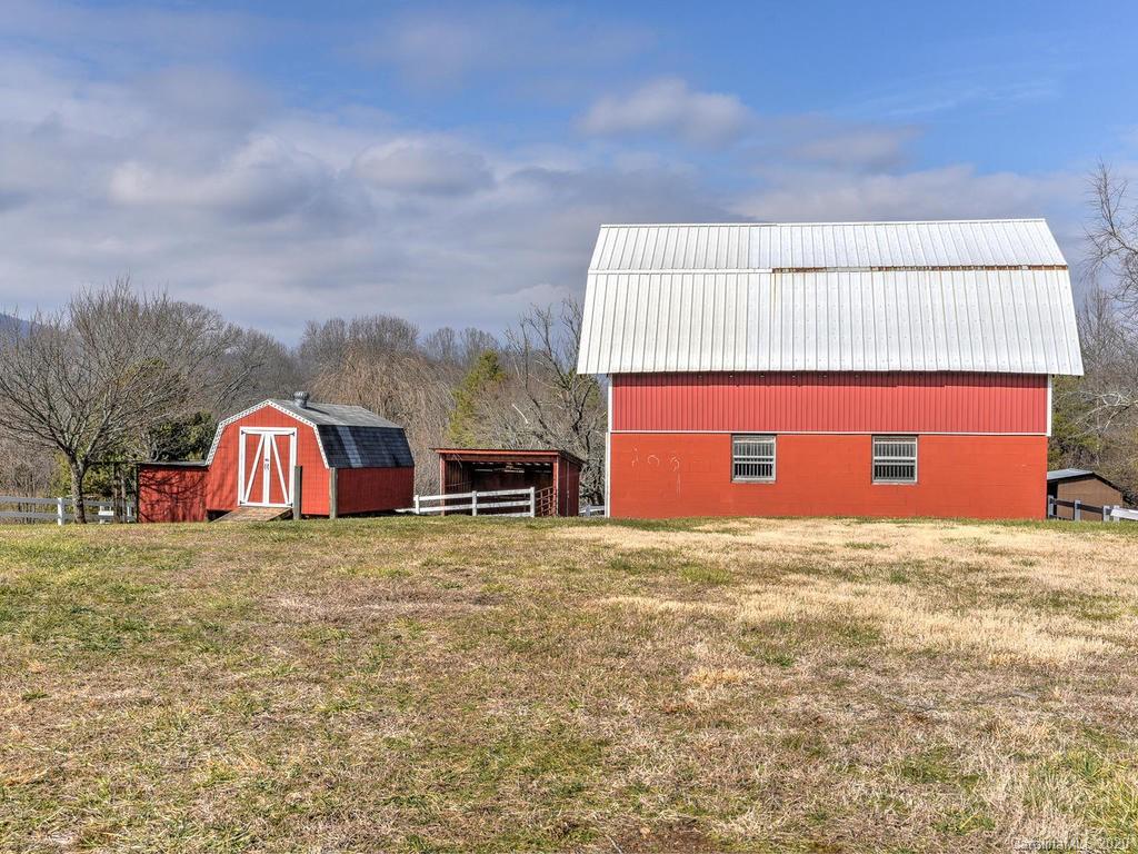 321 Gouges Branch Road Leicester, NC 28748 - Photo 34 of 48 a view of an house with backyard space