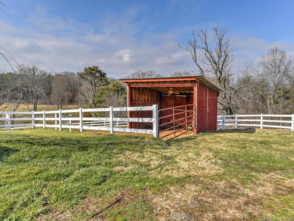 321 Gouges Branch Road Leicester, NC 28748 - Photo 36 of 48 a view of a house with a yard