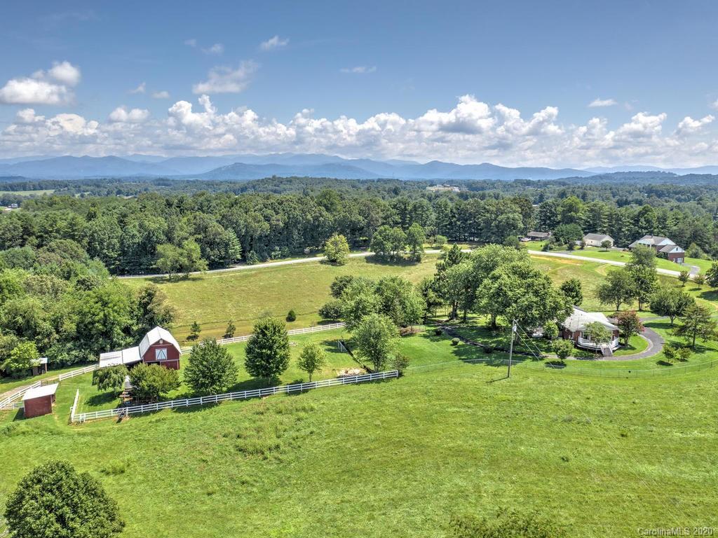 321 Gouges Branch Road Leicester, NC 28748 - Photo 10 of 48 a view of a golf course with an ocean
