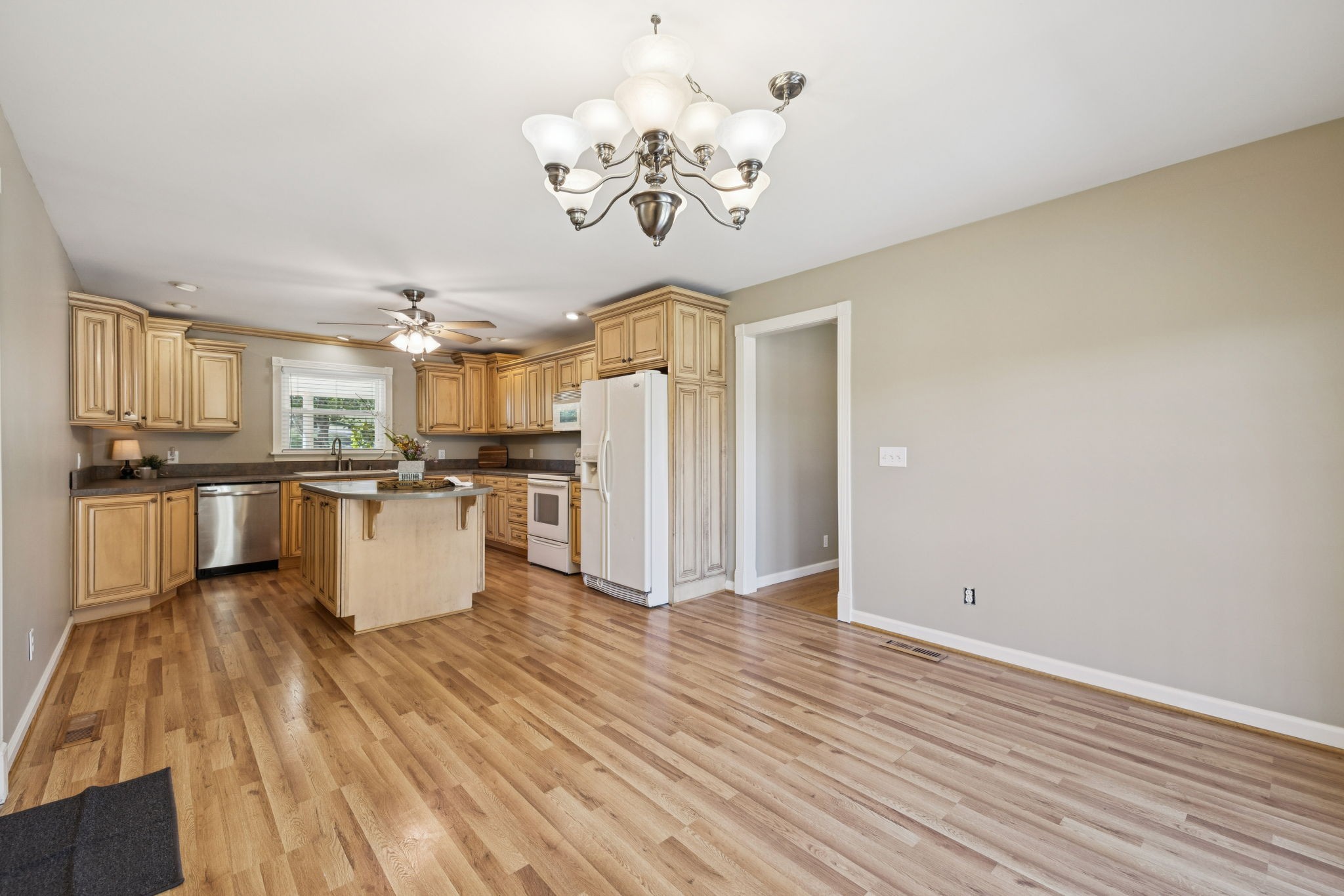 10446 Bold Springs Road McEwen, TN 37101 - Photo 13 of 54 a view of a kitchen with a sink stainless steel appliances