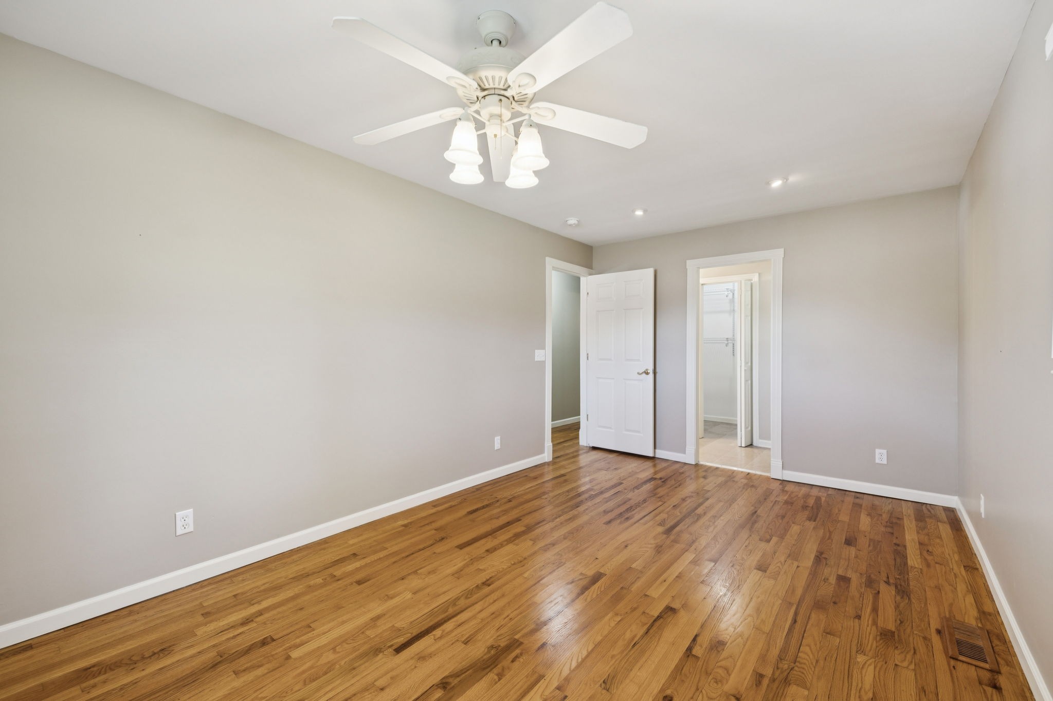 10446 Bold Springs Road McEwen, TN 37101 - Photo 18 of 54 a view of an empty room with wooden floor