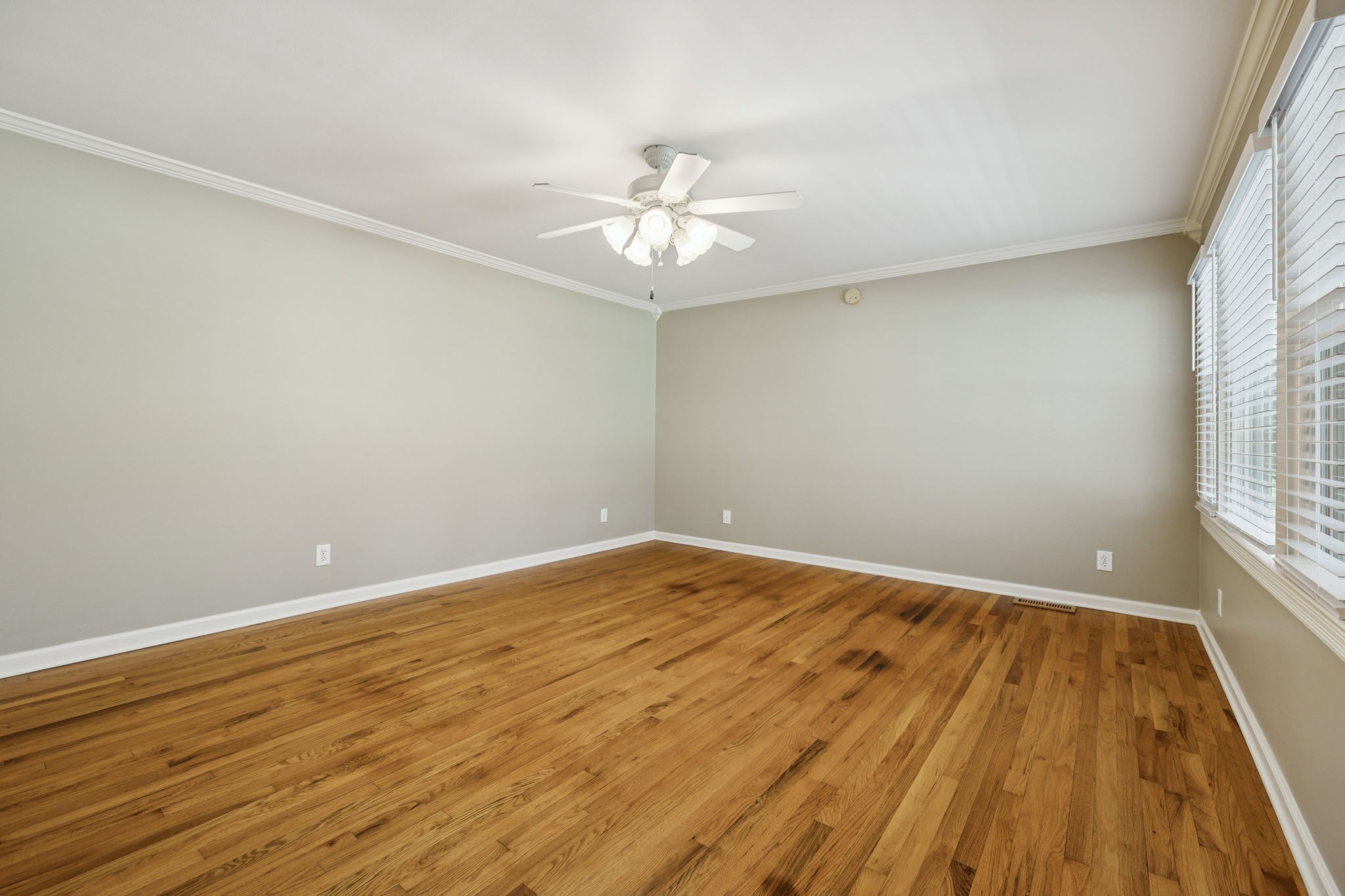 10446 Bold Springs Road McEwen, TN 37101 - Photo 20 of 54 wooden floor in an empty room with a window