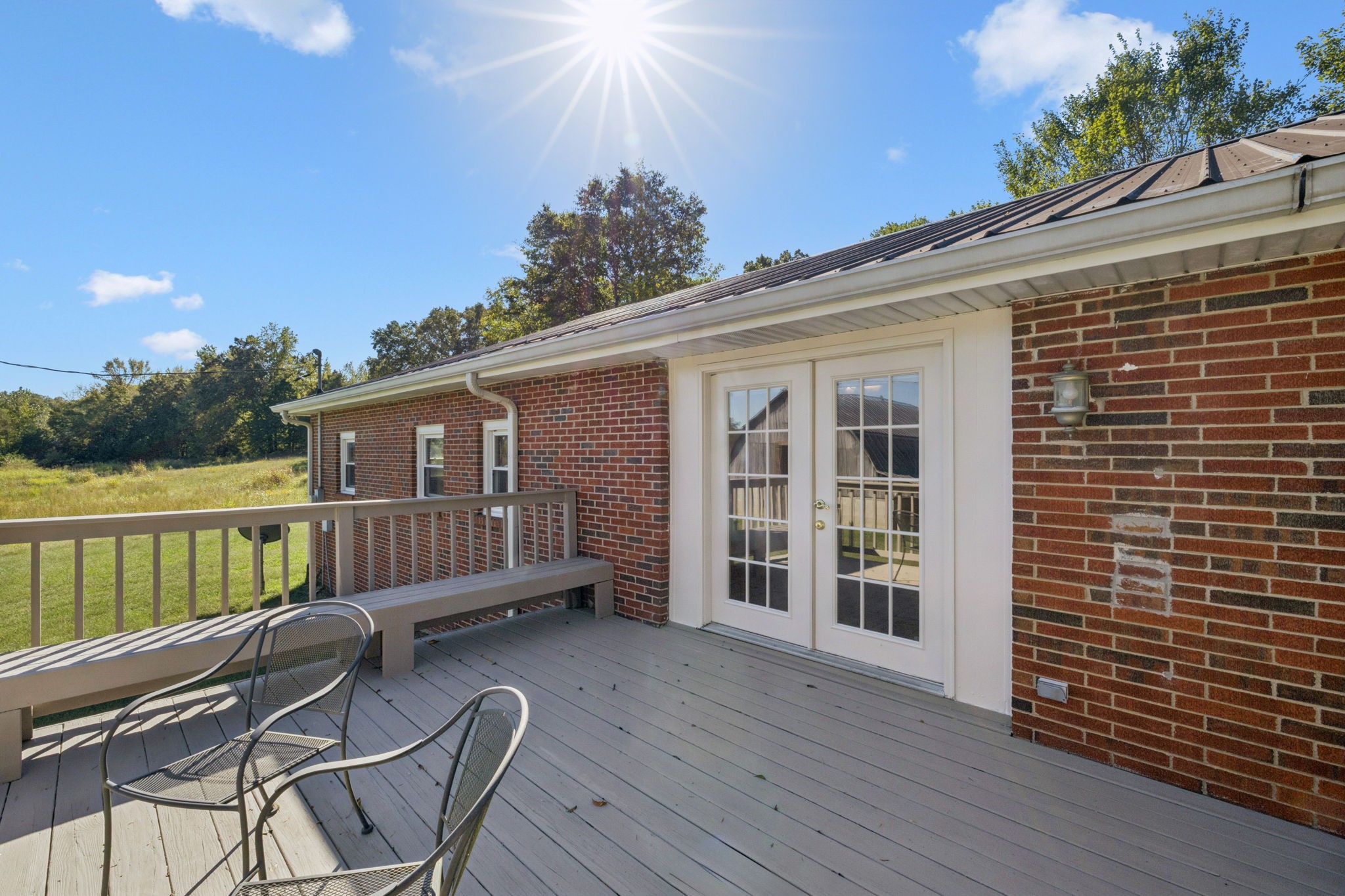 10446 Bold Springs Road McEwen, TN 37101 - Photo 29 of 54 a view of a deck with wooden floor and seating space
