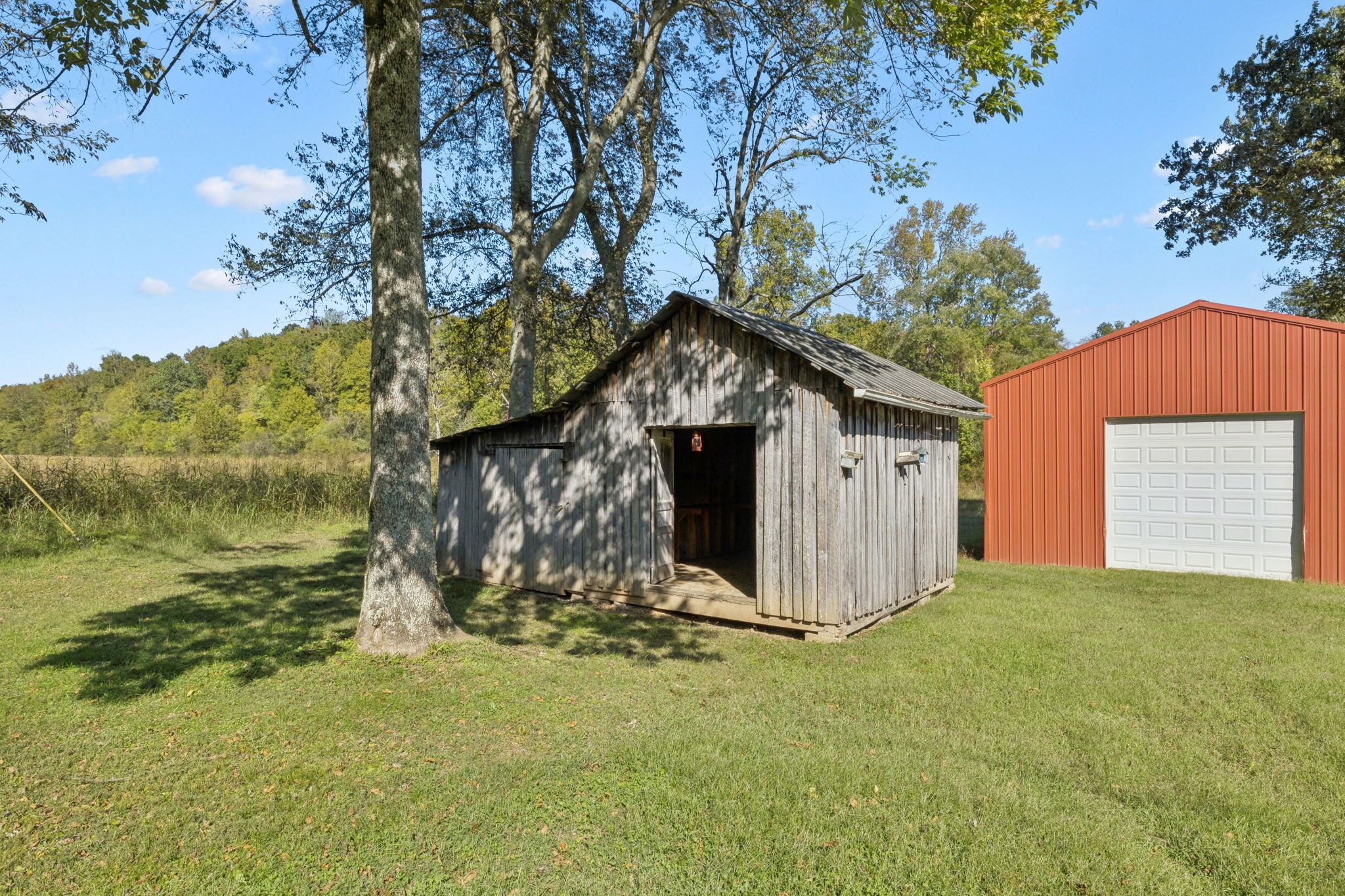 10446 Bold Springs Road McEwen, TN 37101 - Photo 33 of 54 a view of a house with a yard