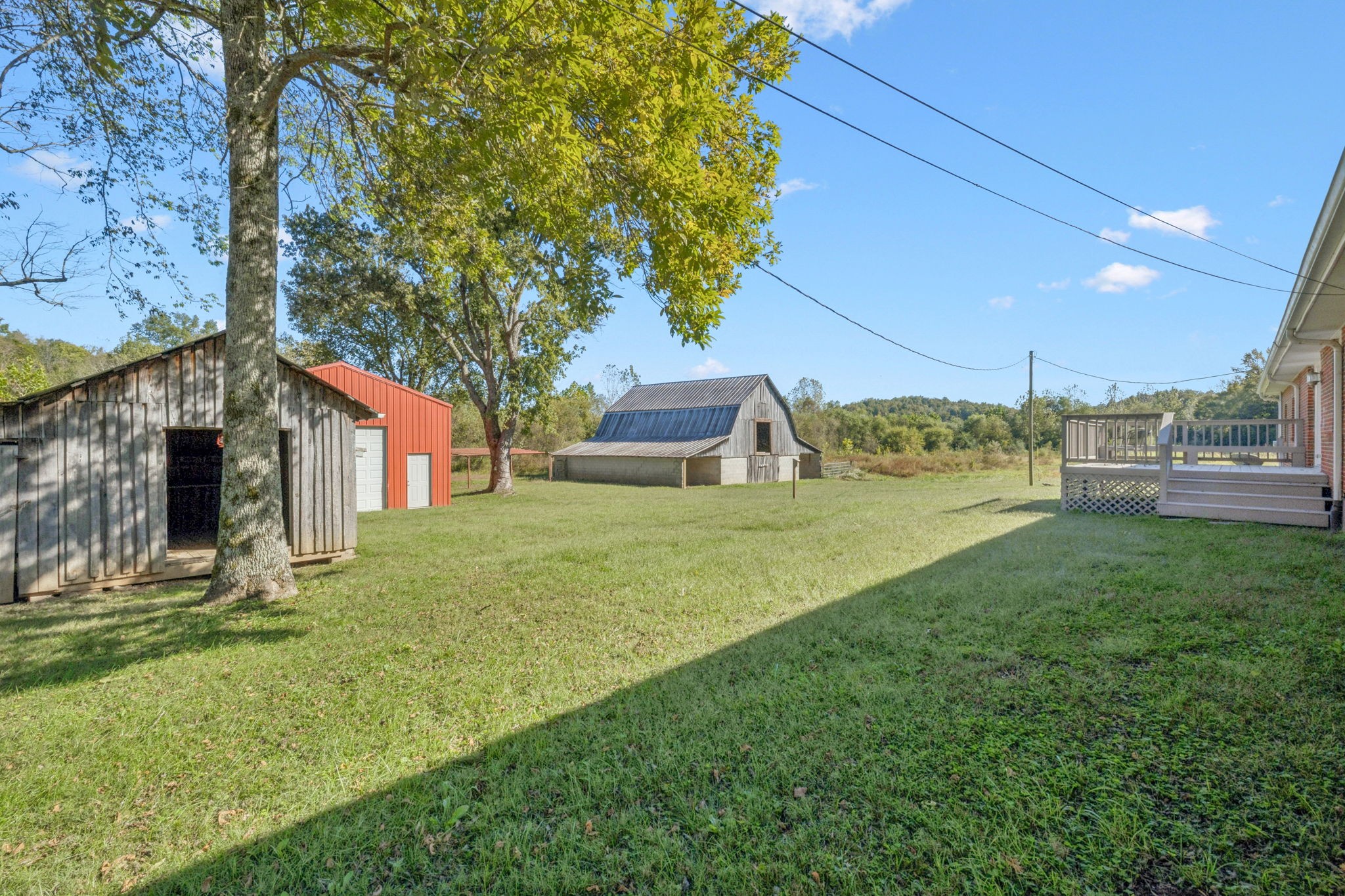 10446 Bold Springs Road McEwen, TN 37101 - Photo 36 of 54 a view of an house with backyard space and balcony