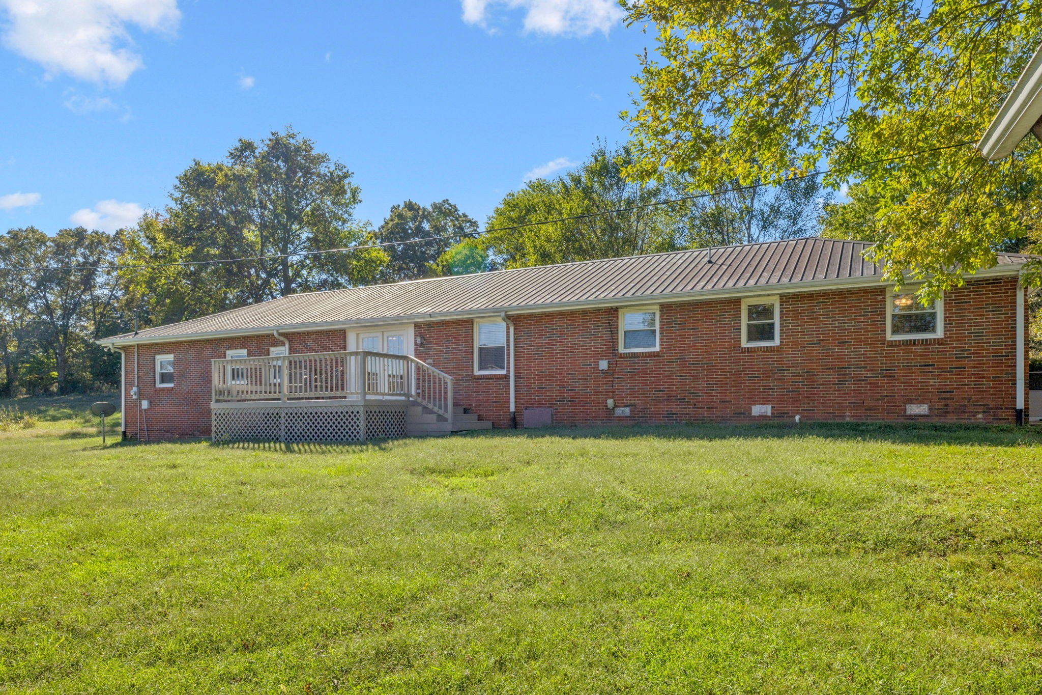 10446 Bold Springs Road McEwen, TN 37101 - Photo 41 of 54 a view of a house with a yard