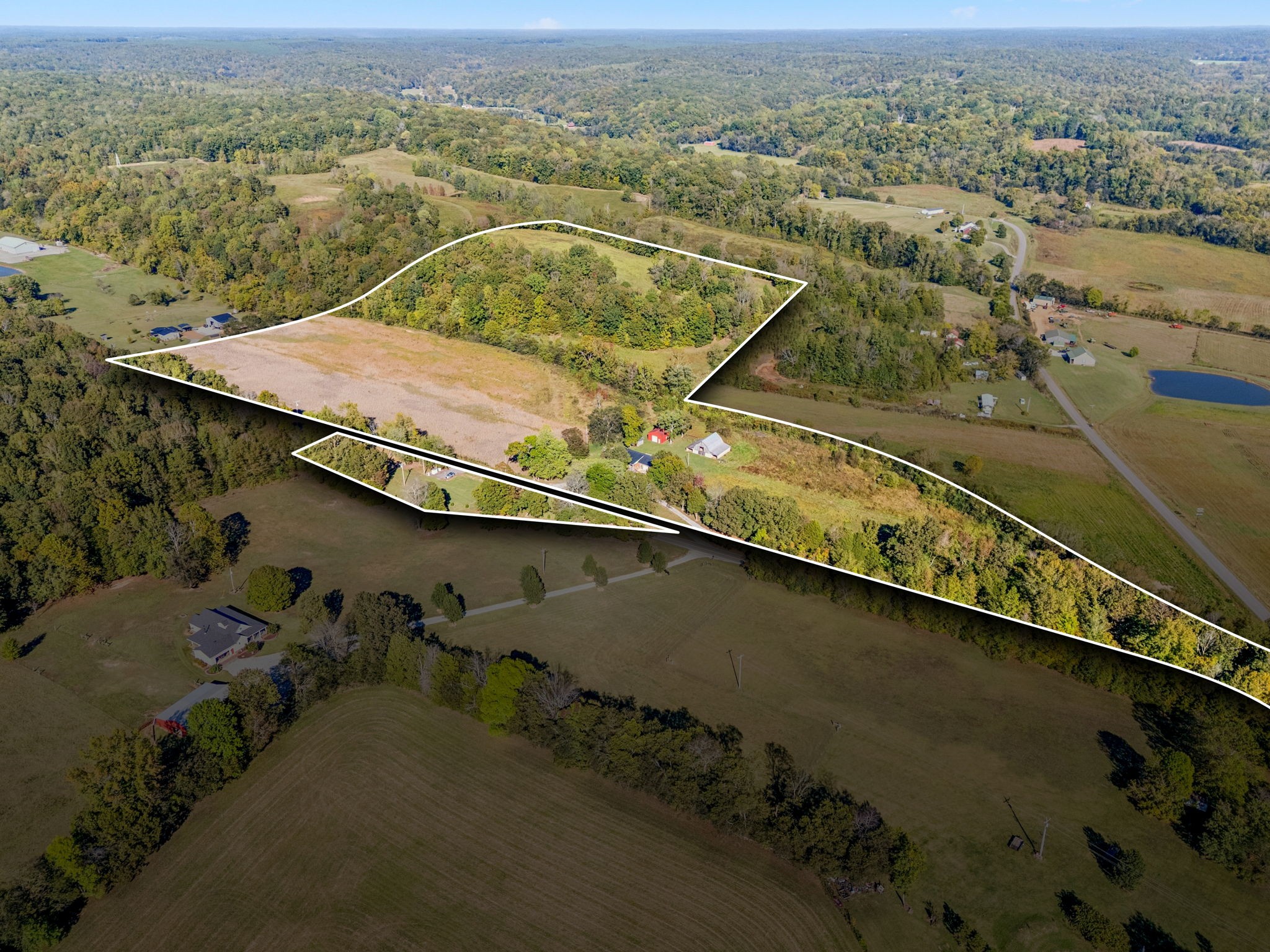 10446 Bold Springs Road McEwen, TN 37101 - Photo 45 of 54 an aerial view of a house with a yard