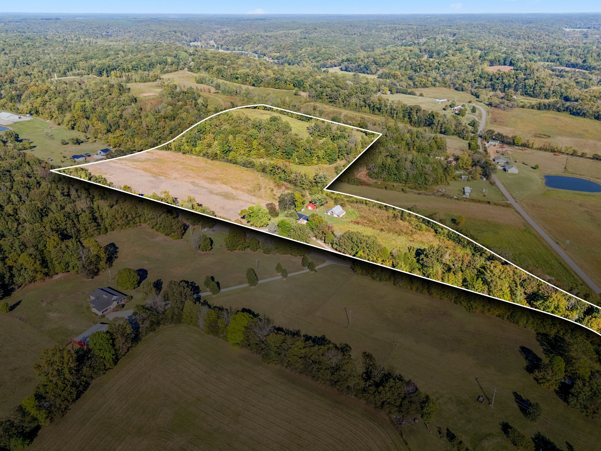 10446 Bold Springs Road McEwen, TN 37101 - Photo 46 of 54 an aerial view of residential houses with outdoor space