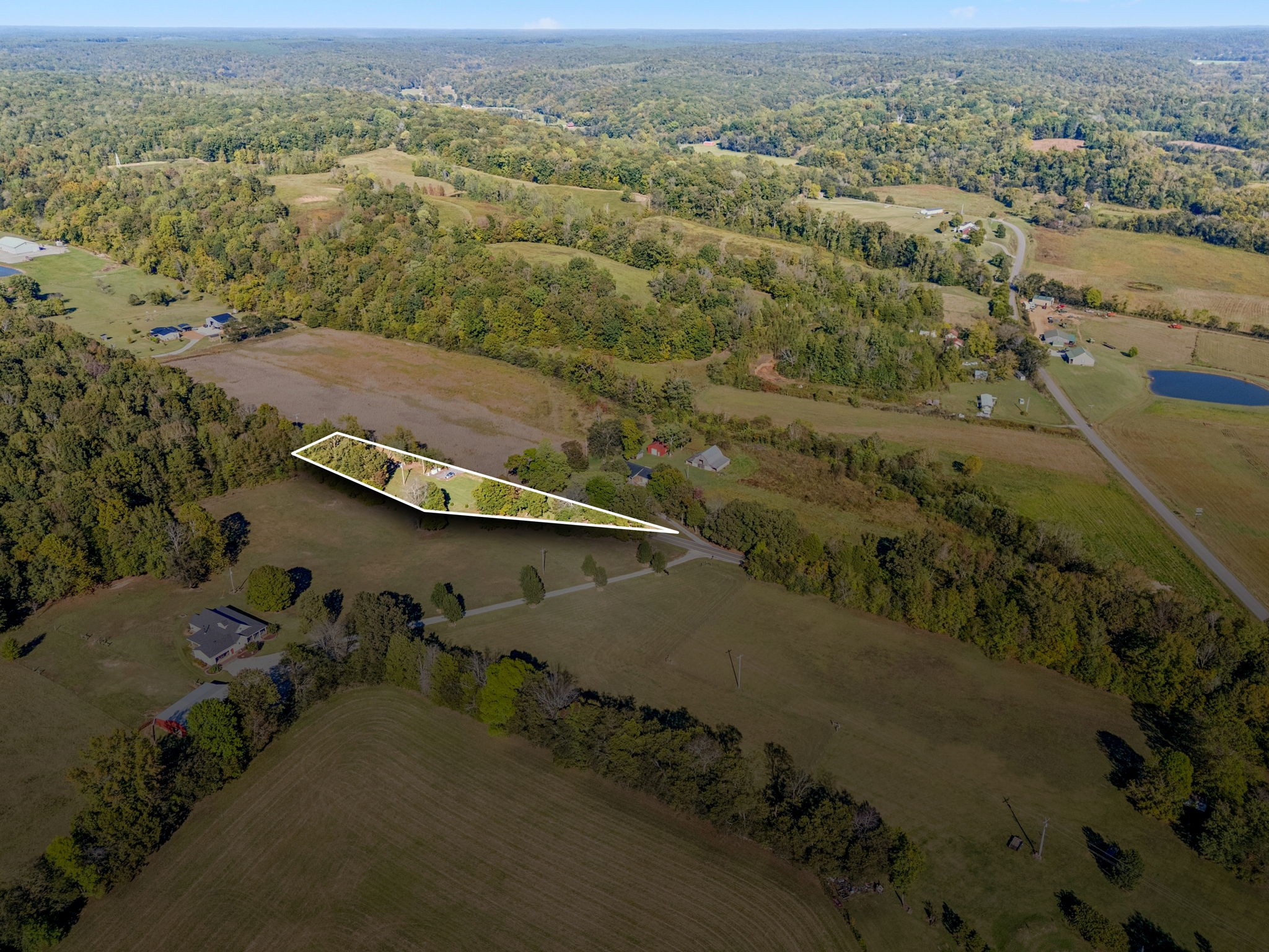 10446 Bold Springs Road McEwen, TN 37101 - Photo 47 of 54 an aerial view of a house with a yard