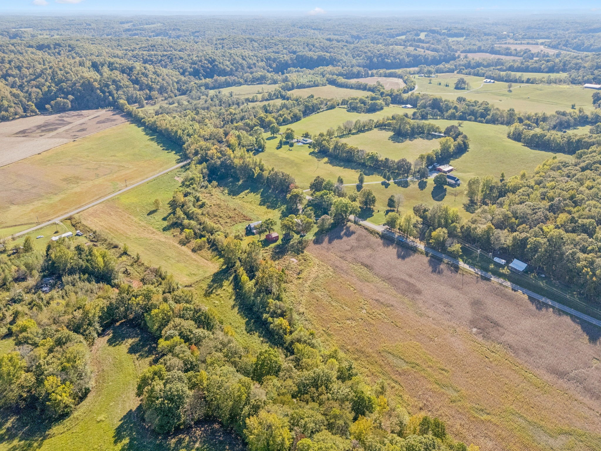 10446 Bold Springs Road McEwen, TN 37101 - Photo 50 of 54 an aerial view of ocean beach and residential houses with outdoor space