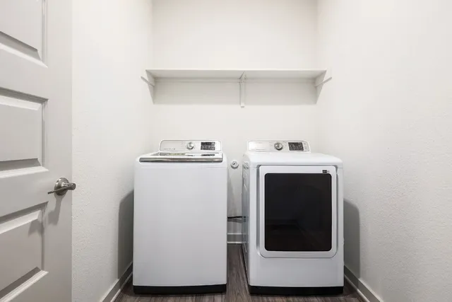a utility room with dryer and washer