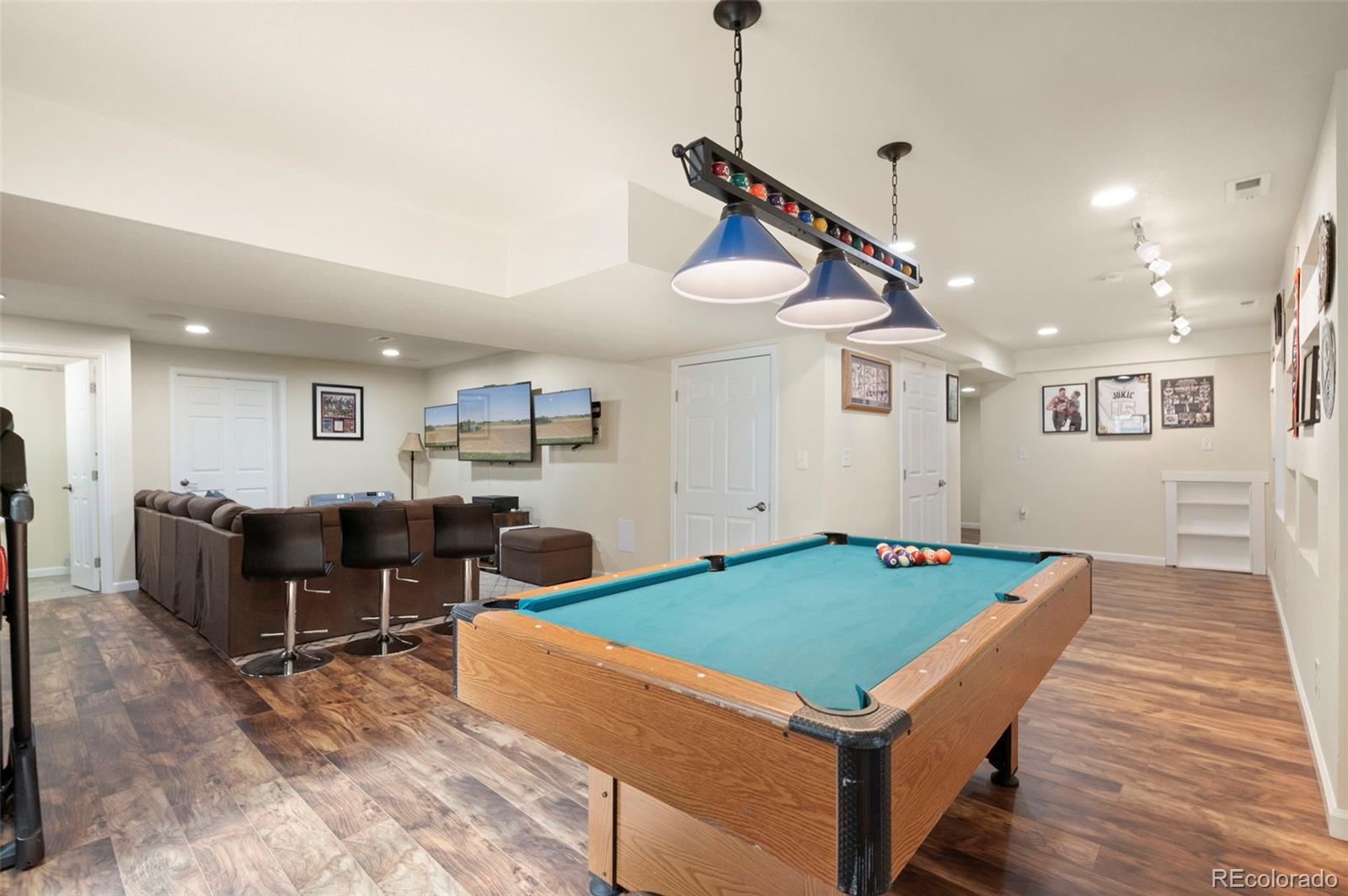 11778 Oneida Street Thornton, CO 80233 - Photo 17 of 30 a living room with kitchen pool table and chairs