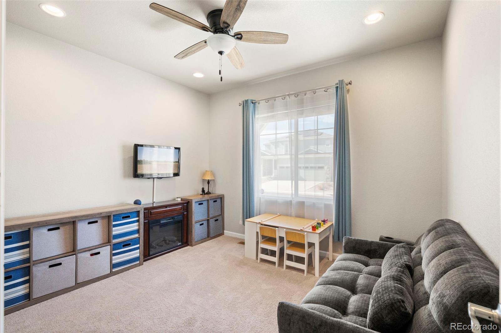 11778 Oneida Street Thornton, CO 80233 - Photo 8 of 30 a living room with furniture