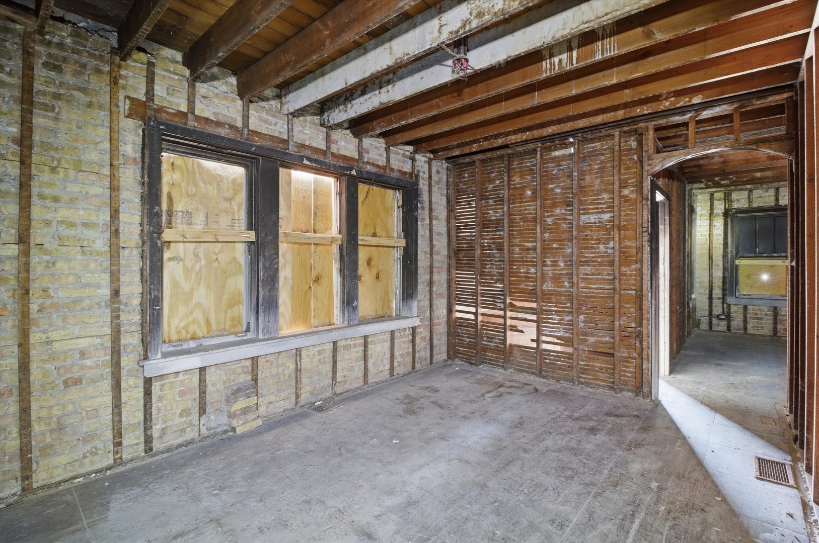 4745 West Ohio Street Chicago, IL 60644 - Photo 4 of 15 a view of an empty room with a balcony