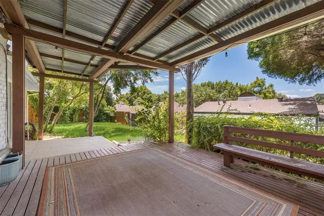 a garden view with a seating space