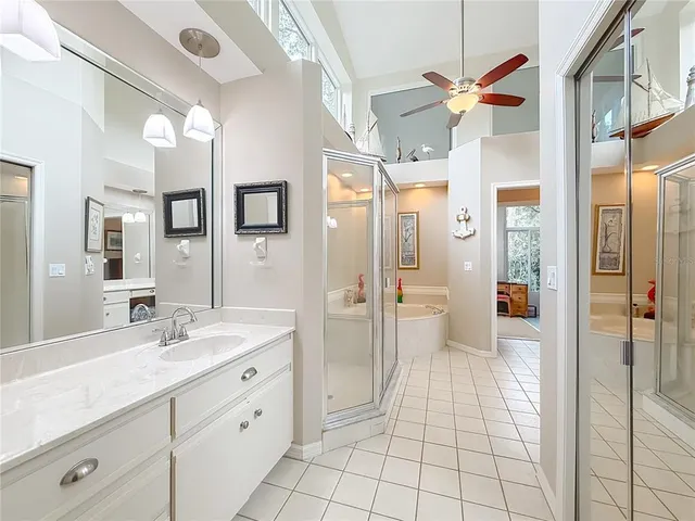 a kitchen with a white cabinets and white appliances