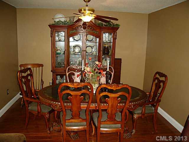 2311 Lawrence Road Clover, SC 29710 - Photo 6 of 8 a view of a dining room with furniture and a chandelier