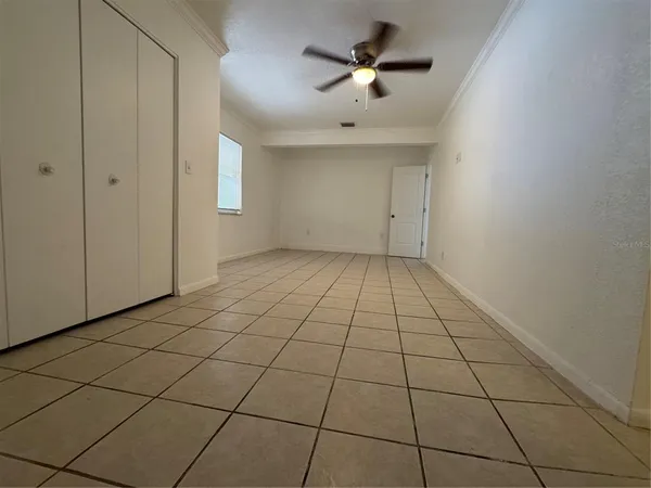 a bathroom with a vanity mirror and bathtub