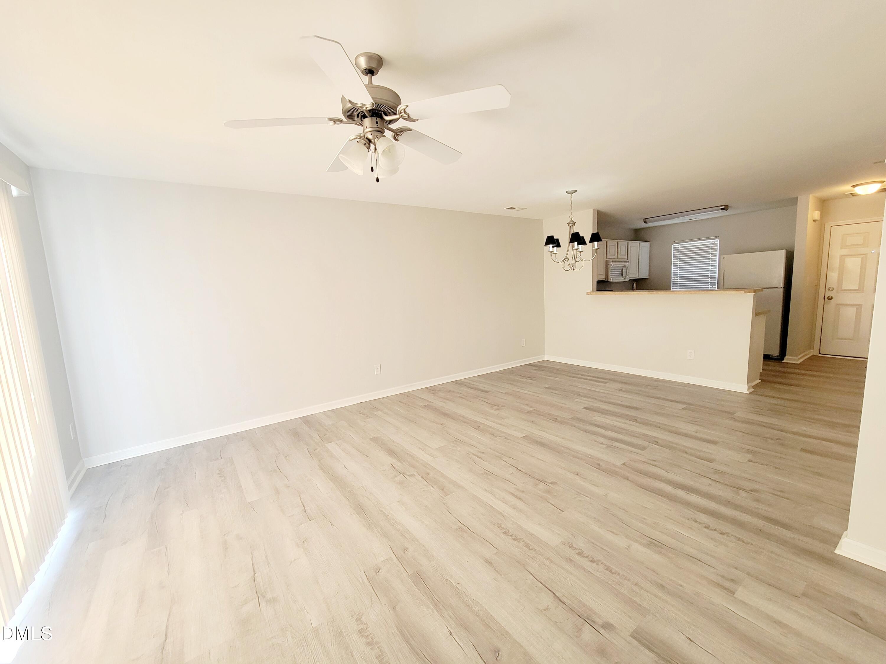 1407 Plexor Lane Knightdale, NC 27545 - Photo 11 of 43 a view of empty room with wooden floor