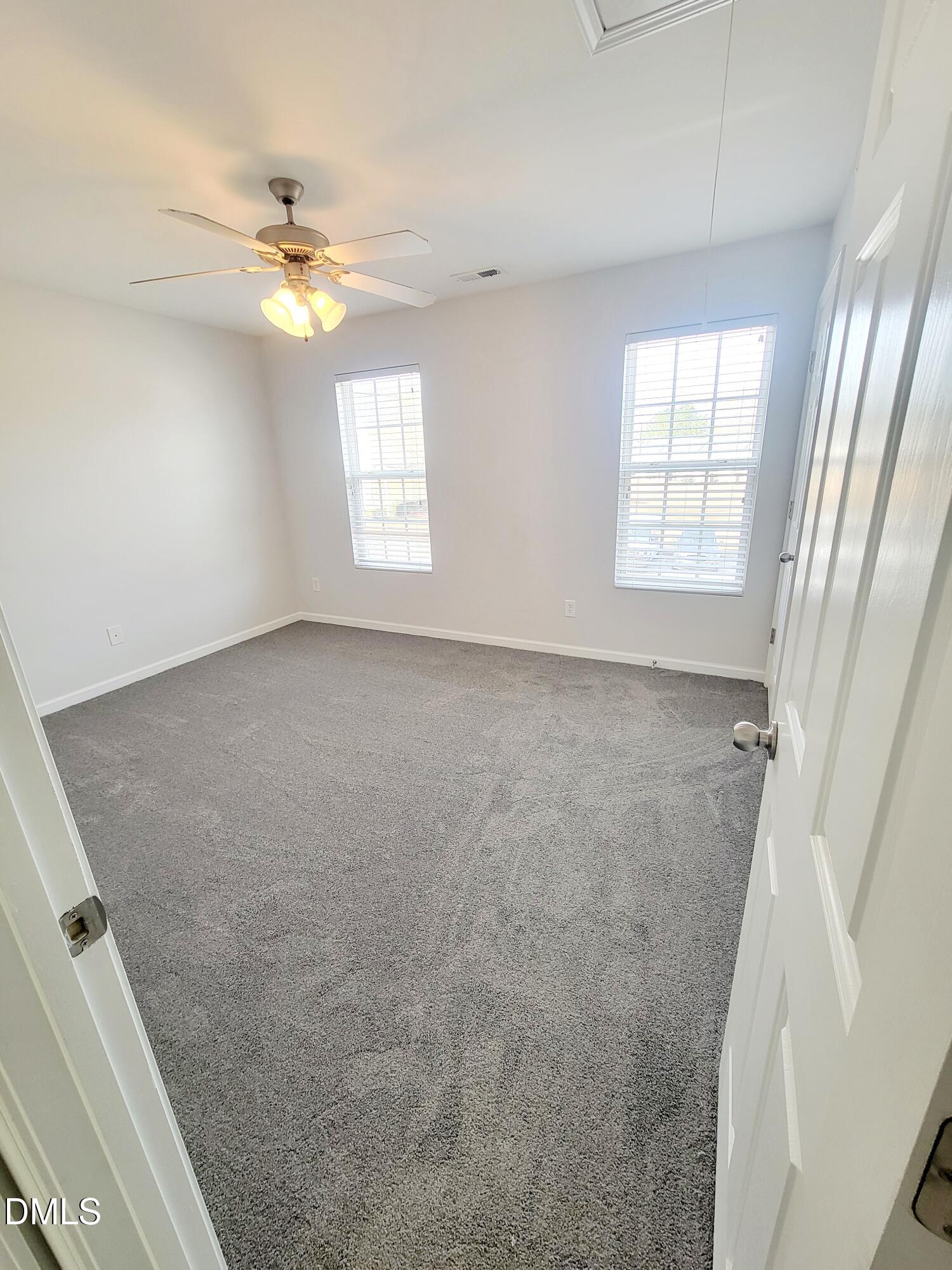 1407 Plexor Lane Knightdale, NC 27545 - Photo 26 of 43 a view of an empty room with a window